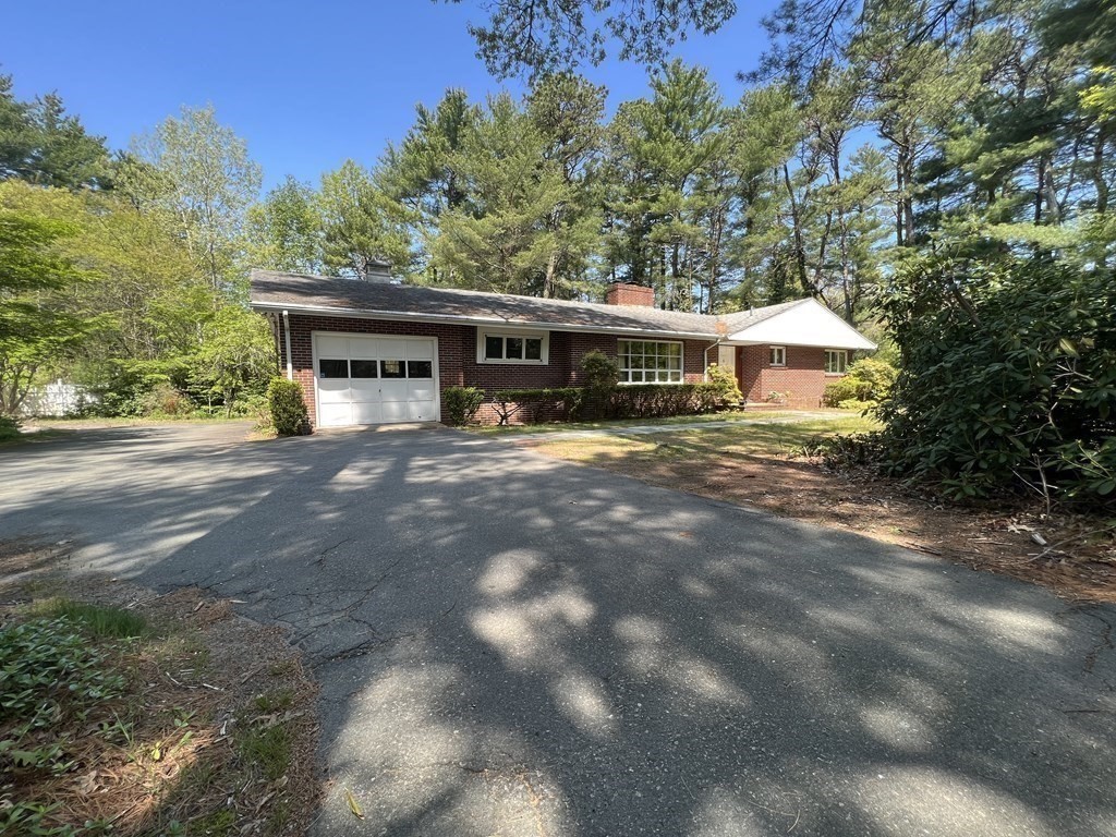 325 Marion Road Wareham, MA 02571 - Photo 4 of 29 a view of a house with a yard