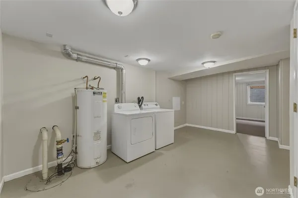 a utility room with cabinets