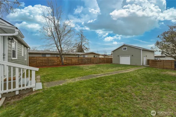 a house view with garden space