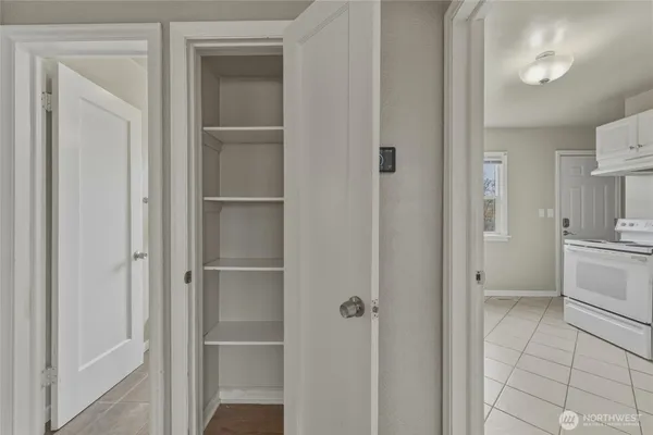 a bathroom with a shower and a sink