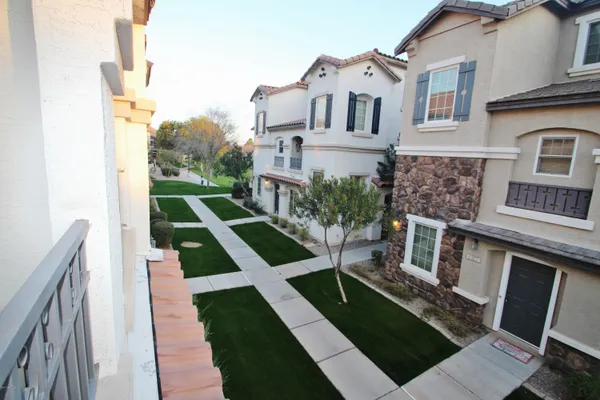 a aerial view of a house with a yard