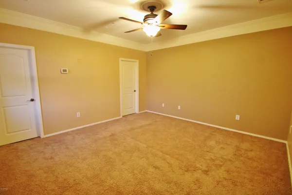 a view of a big room with carpet