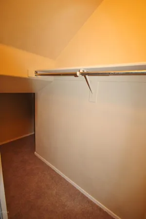 a view of small space with racks on the wall