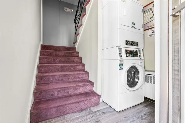 a view of entryway with washer and dryer