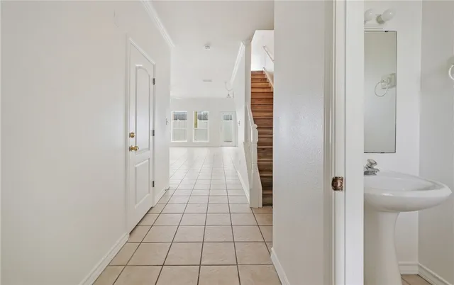 a view of a bathroom with white door