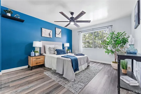 a bed room with a bed and a window