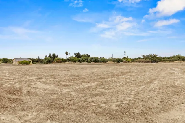 a view of a lake with beach