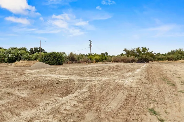 a view of a road with an ocean view