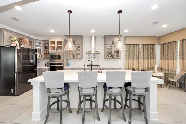 a en suite bathroom with a sink and a mirror