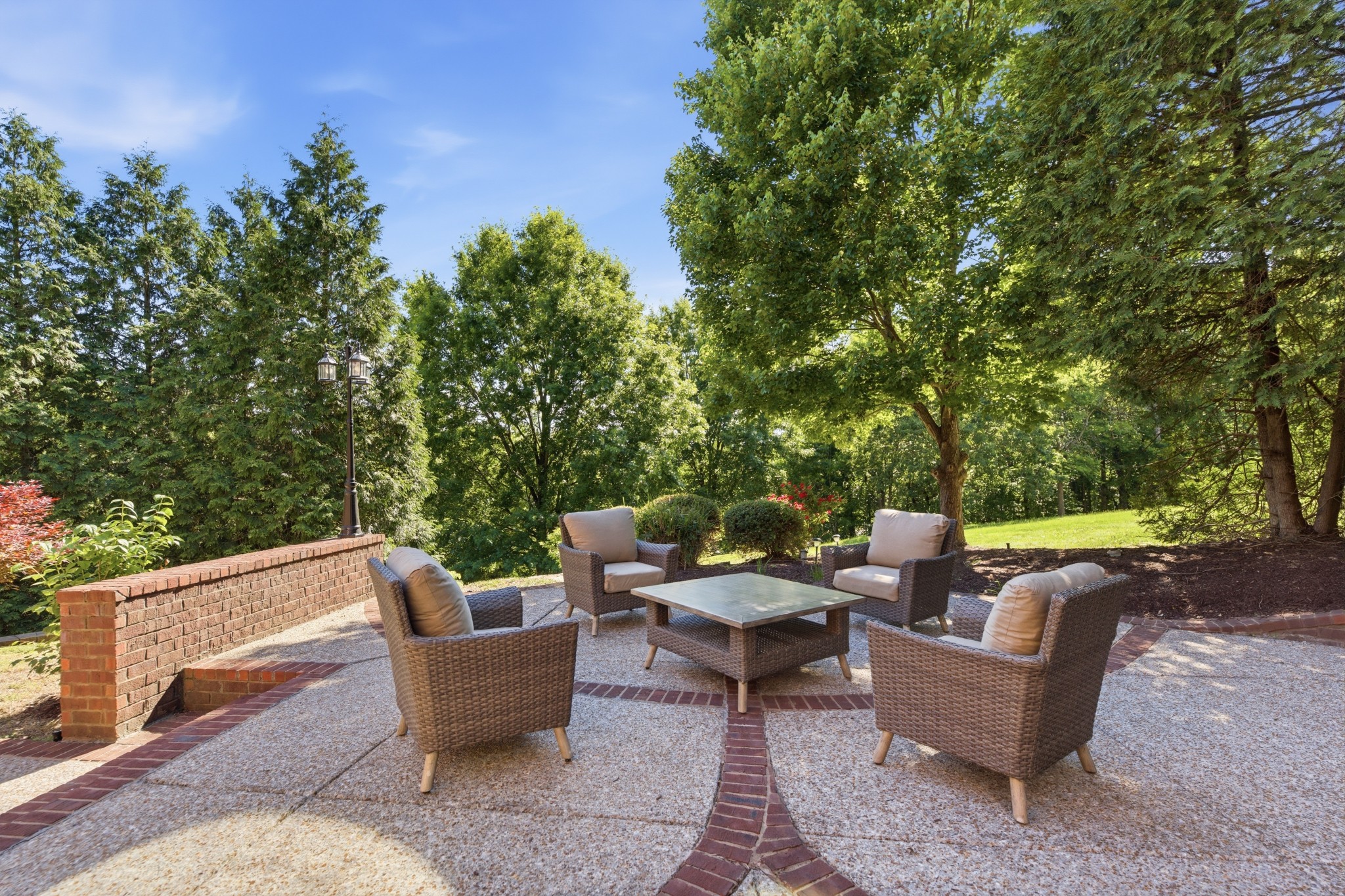 319 Hamlets End Way Franklin, TN 37067 - Photo 49 of 54 a view of a patio with couches and a table and chairs with wooden fence