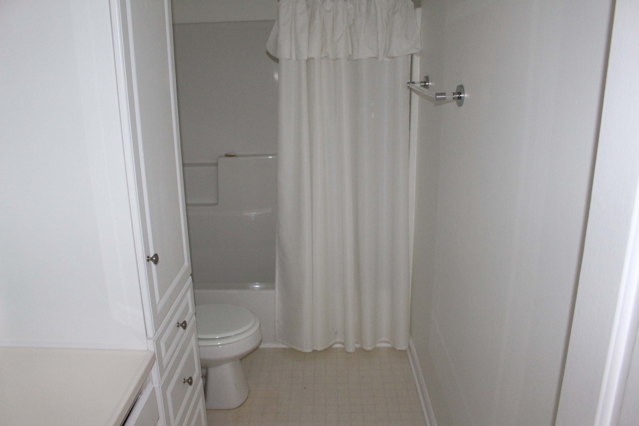 3114 Chanda Lane Murfreesboro, TN 37129 - Photo 9 of 13 a bathroom with a granite countertop toilet a sink and shower