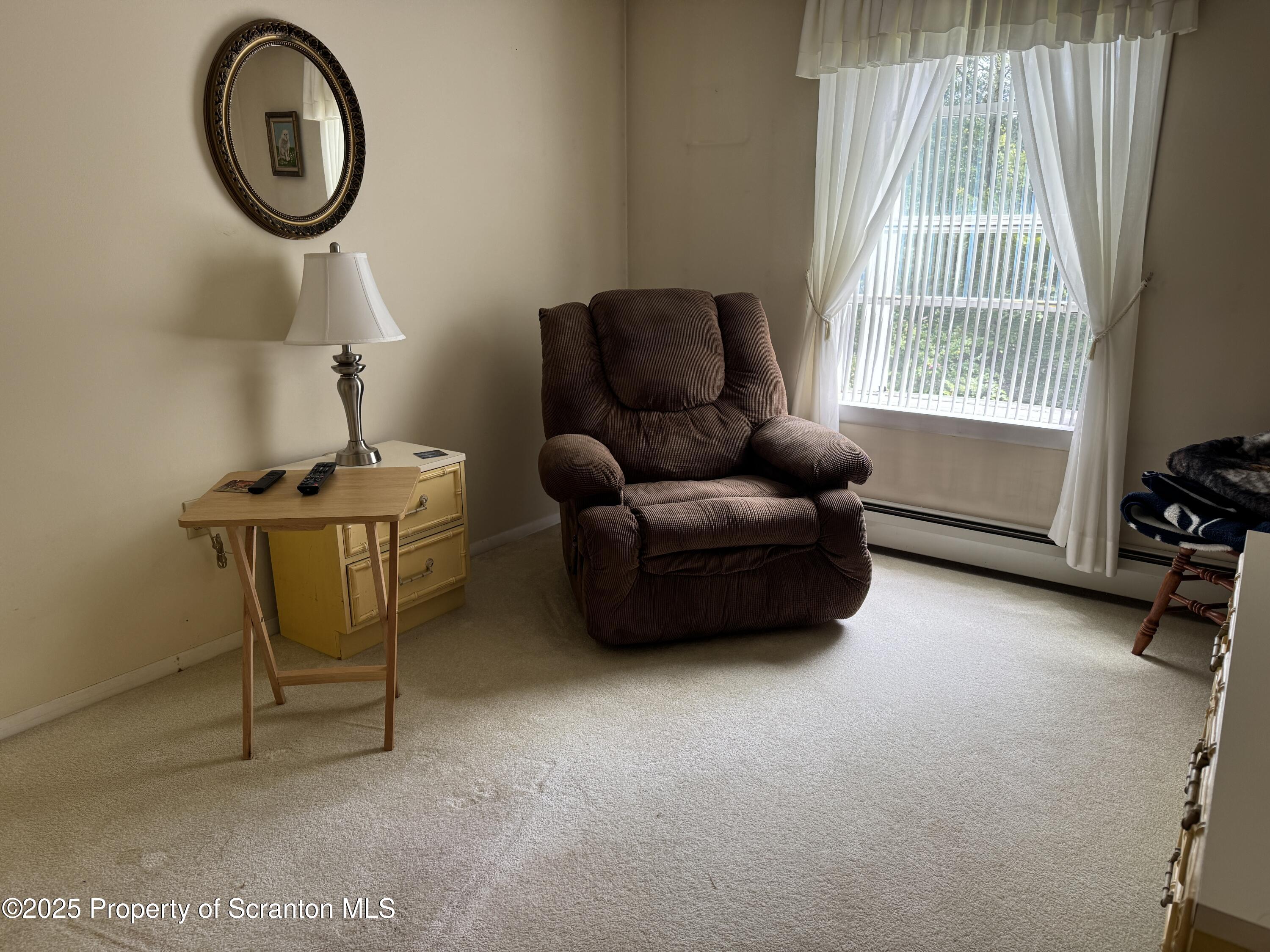 2356 Newton Ransom Boulevard Clarks Summit, PA 18411 - Photo 11 of 30 a living room with furniture and a window
