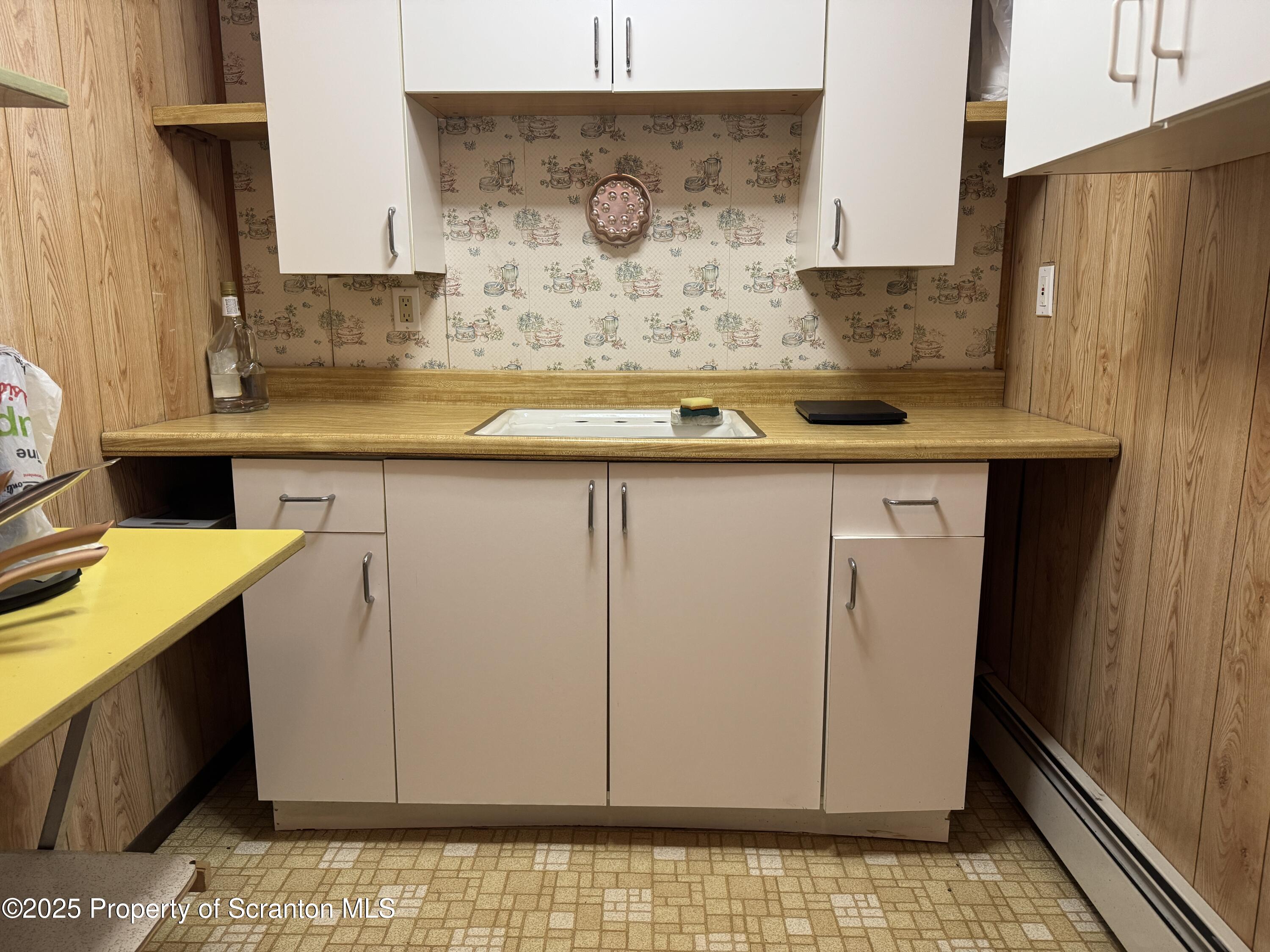 2356 Newton Ransom Boulevard Clarks Summit, PA 18411 - Photo 17 of 30 a bathroom with a sink and a mirror