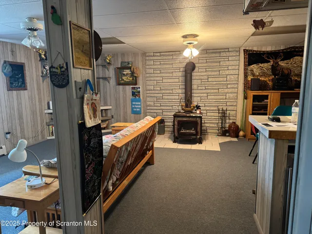 a bedroom with furniture and a bed