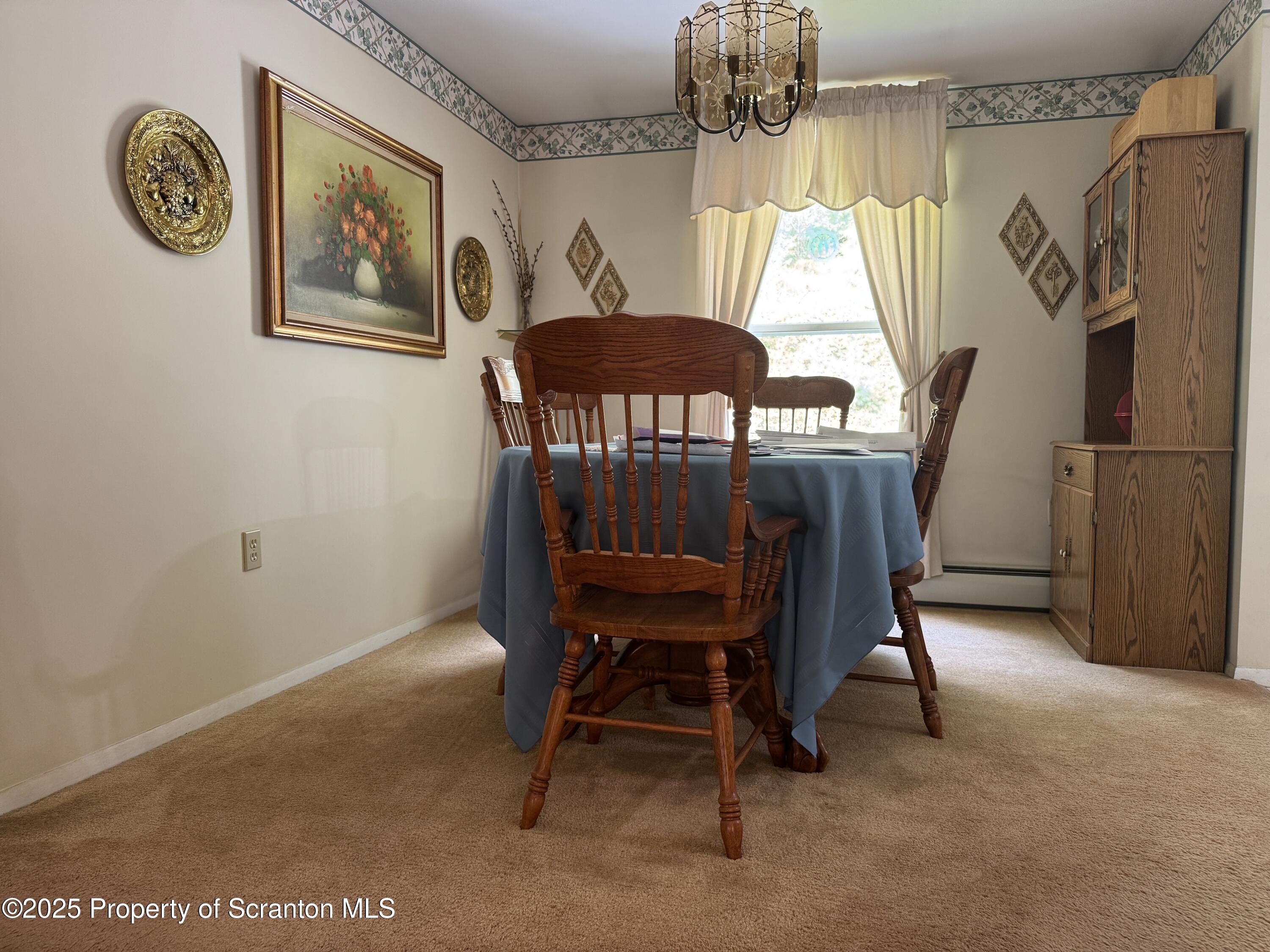 2356 Newton Ransom Boulevard Clarks Summit, PA 18411 - Photo 8 of 30 a view of a dining room with furniture and a window
