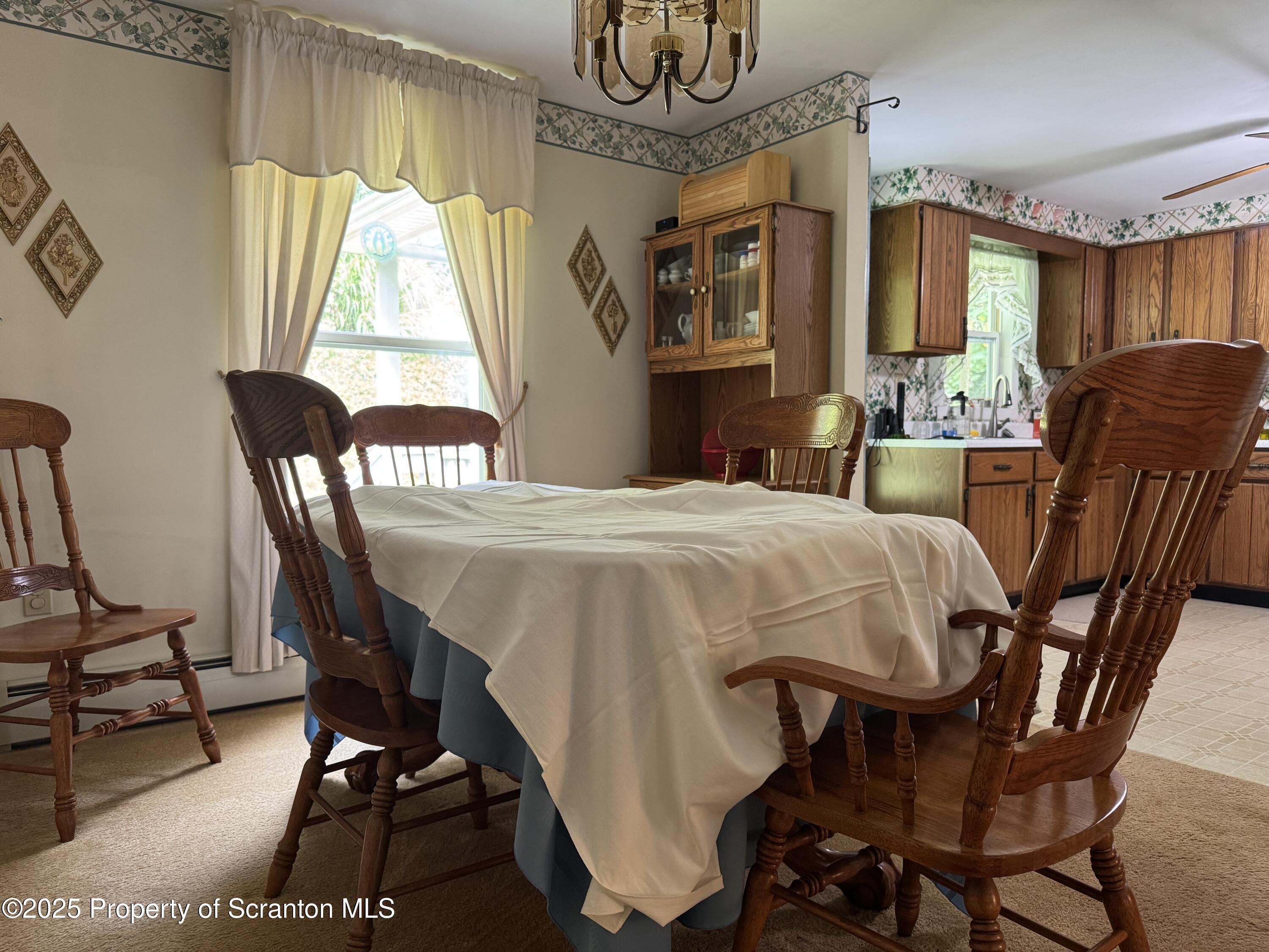 2356 Newton Ransom Boulevard Clarks Summit, PA 18411 - Photo 9 of 30 a dining room with furniture and window