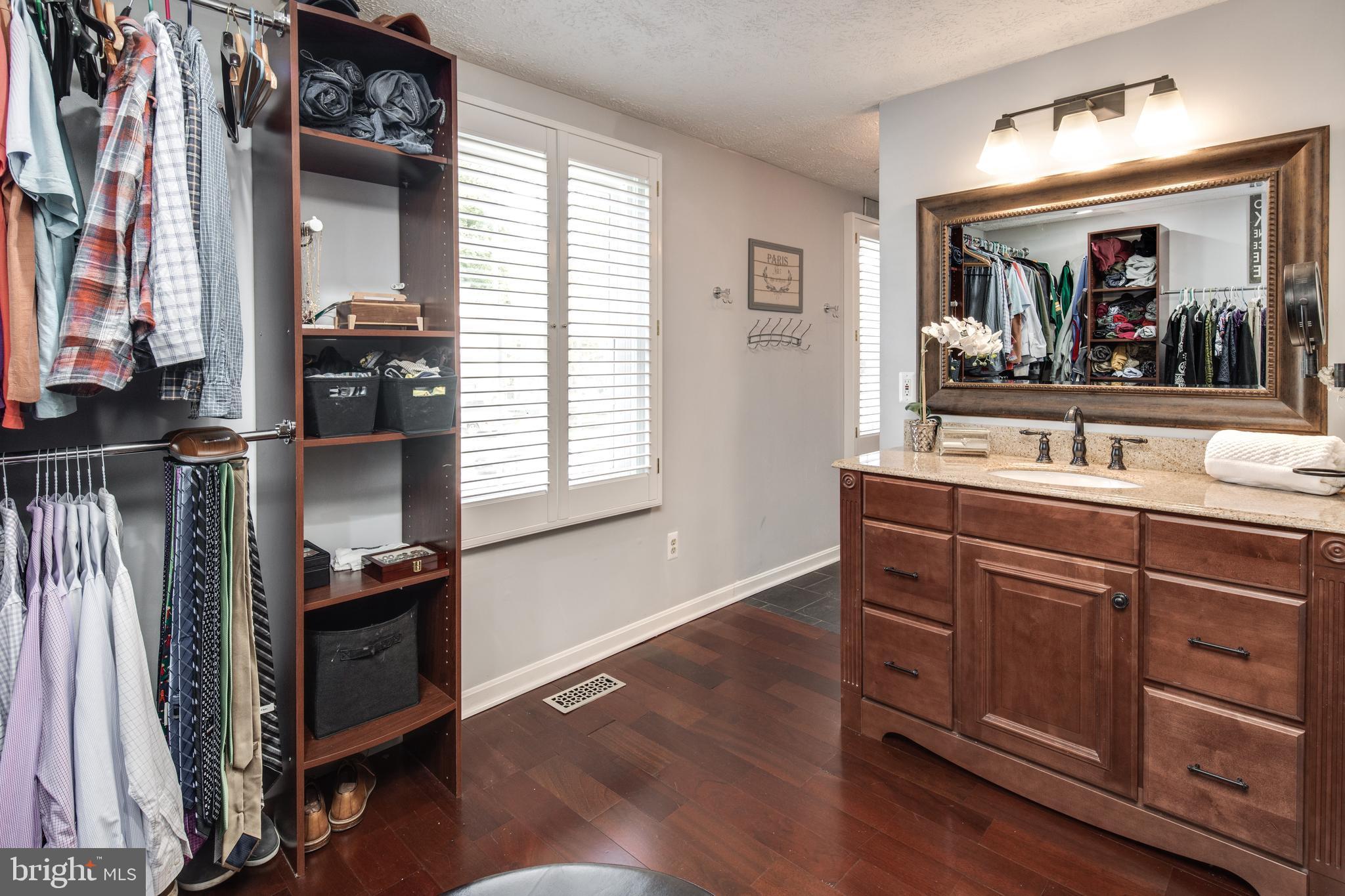 8325 Magic Leaf Road Springfield, VA 22153 - Photo 22 of 40 Master closet / vanity