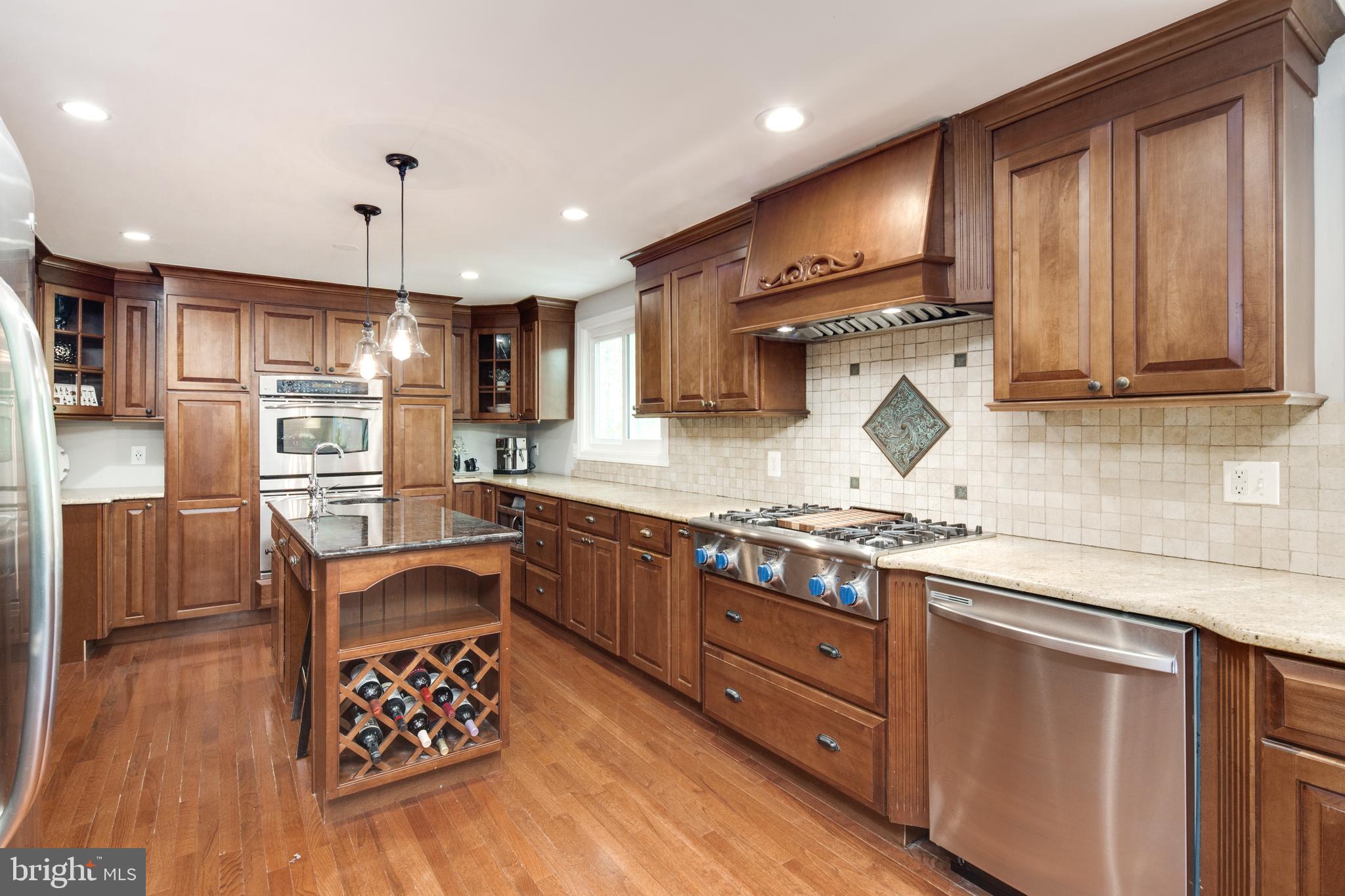 8325 Magic Leaf Road Springfield, VA 22153 - Photo 9 of 40 Island with seating for 3