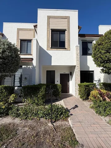 a house view with a outdoor space