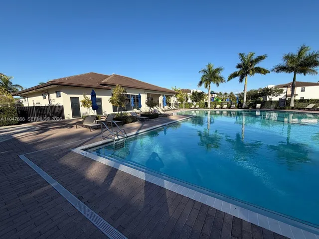 a view of a balcony with two chairs