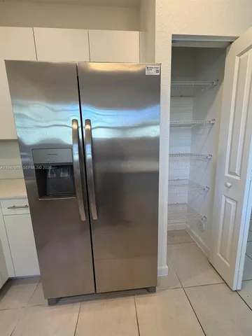 a close view of a refrigerator in kitchen