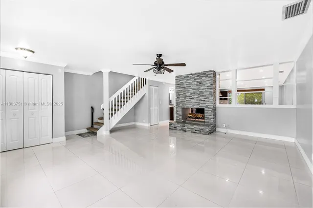 a view of livingroom with furniture and fireplace