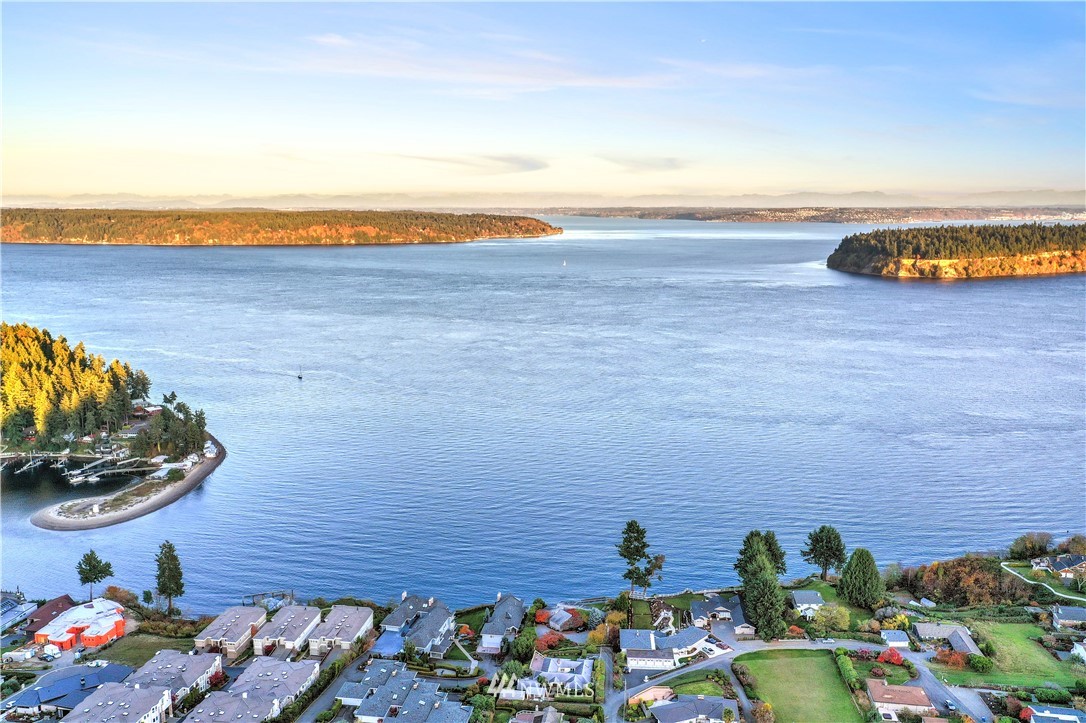 7002 Soundview Drive Gig Harbor, WA 98335 - Photo 2 of 33 a view of a lake with a sitting area