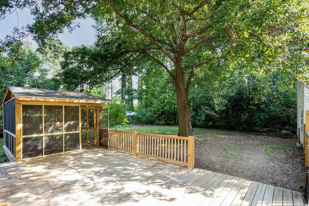 307 South King Charles Road Raleigh, NC 27610 - Photo 13 of 32 a view of a house with a yard