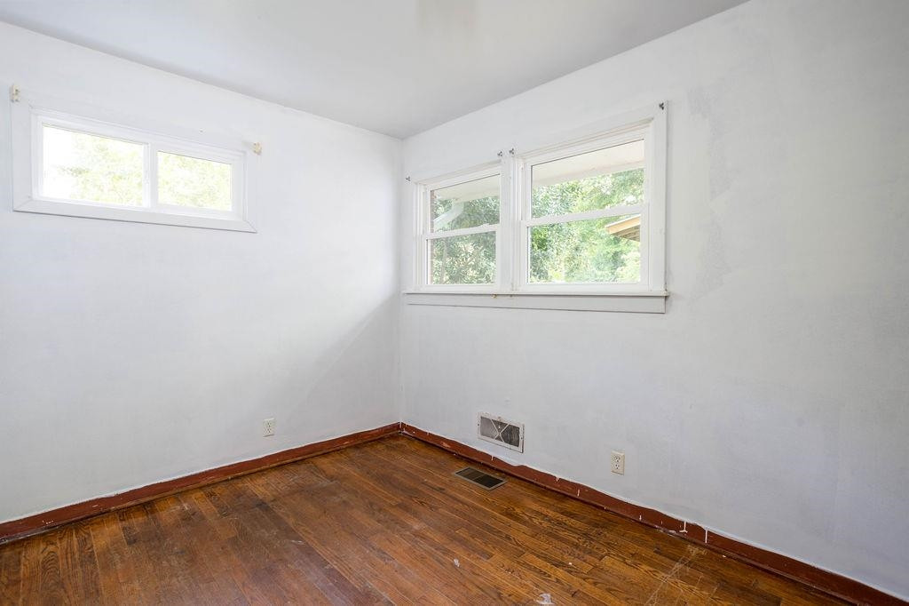 307 South King Charles Road Raleigh, NC 27610 - Photo 21 of 32 an empty room with a window