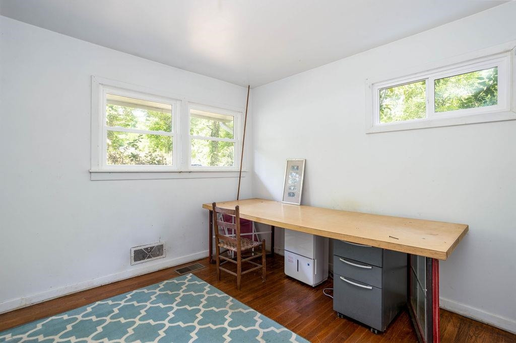 307 South King Charles Road Raleigh, NC 27610 - Photo 23 of 32 a room with furniture and a window
