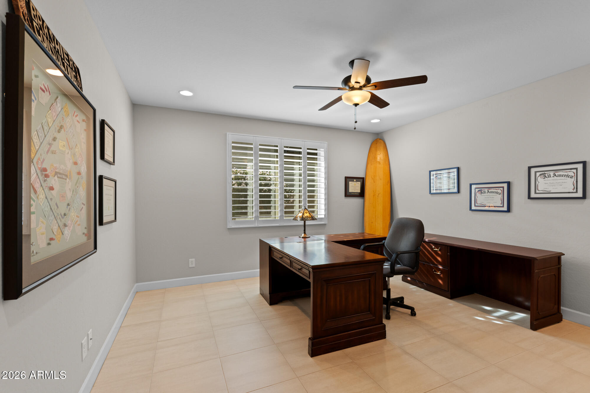 16705 Virginia Avenue Goodyear, AZ 85395 - Photo 22 of 56 a living room with furniture and a window