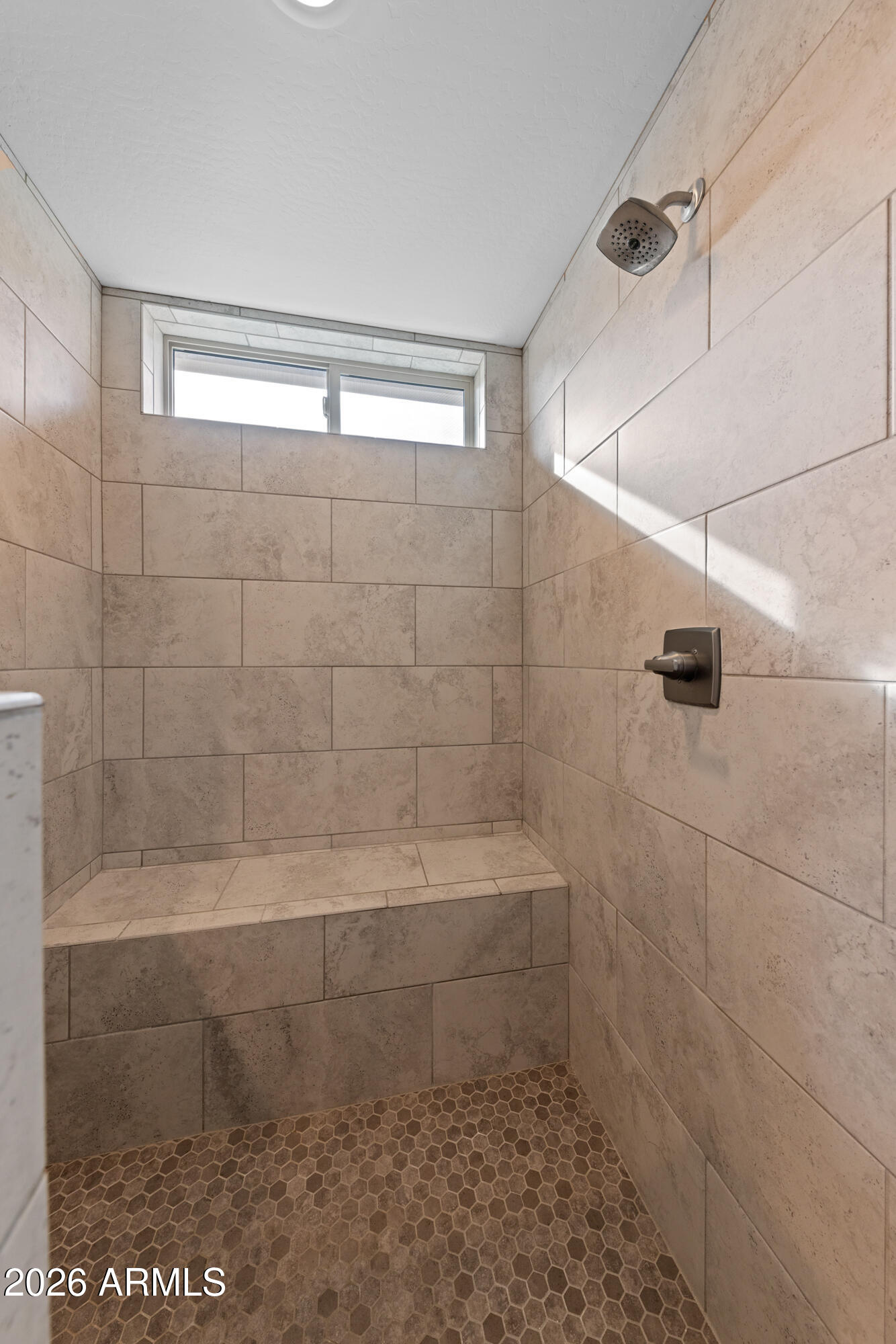 16705 Virginia Avenue Goodyear, AZ 85395 - Photo 25 of 56 a bathroom with a shower