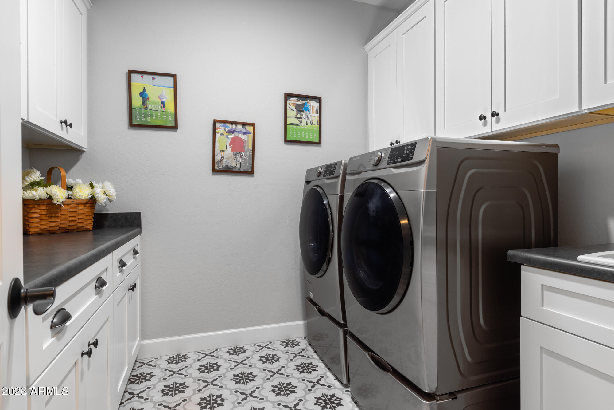 16705 Virginia Avenue Goodyear, AZ 85395 - Photo 29 of 56 a utility room with dryer and washer