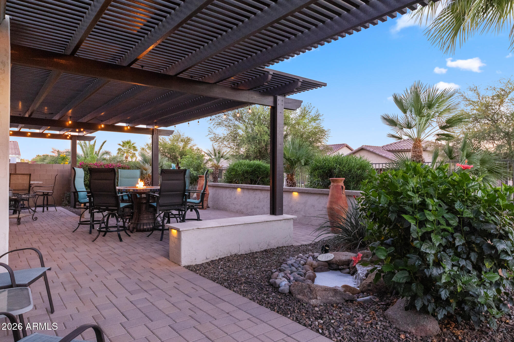 16705 Virginia Avenue Goodyear, AZ 85395 - Photo 37 of 56 a view of a table and chairs in patio