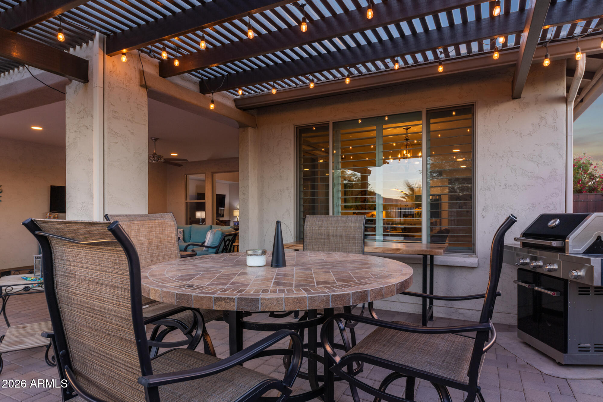 16705 Virginia Avenue Goodyear, AZ 85395 - Photo 42 of 56 a view of a dining room with furniture