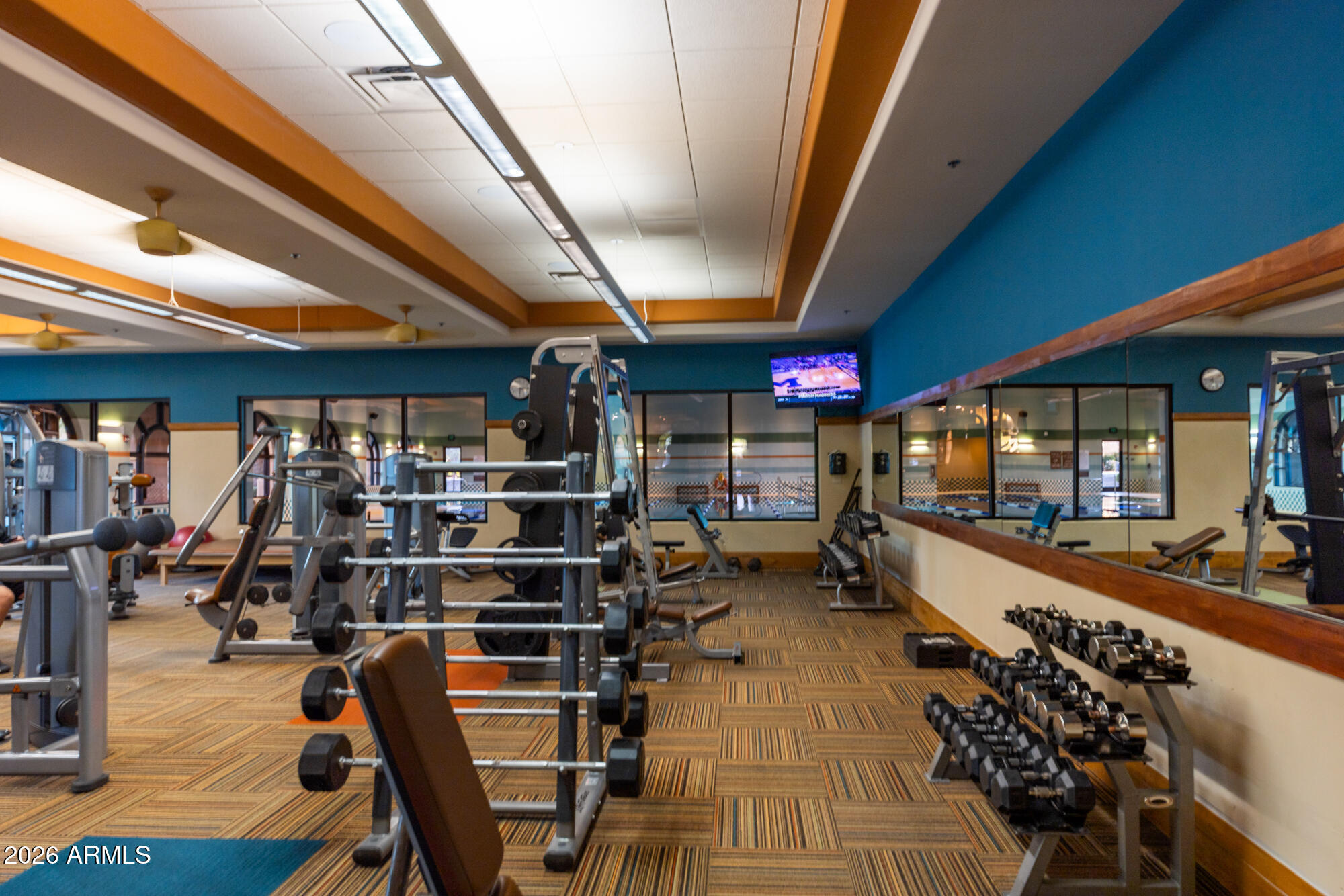 16705 Virginia Avenue Goodyear, AZ 85395 - Photo 50 of 56 a view of a room with gym equipment