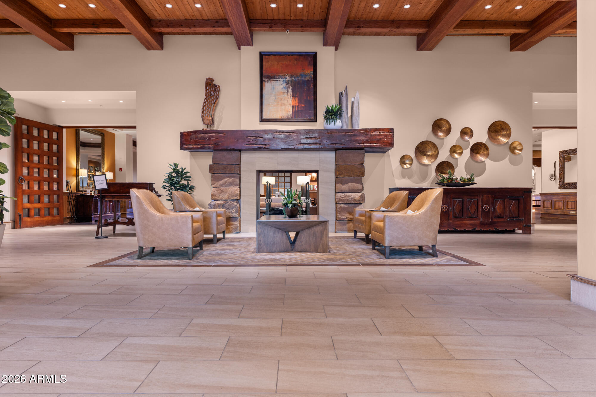 16705 Virginia Avenue Goodyear, AZ 85395 - Photo 51 of 56 a living room with furniture and a fireplace
