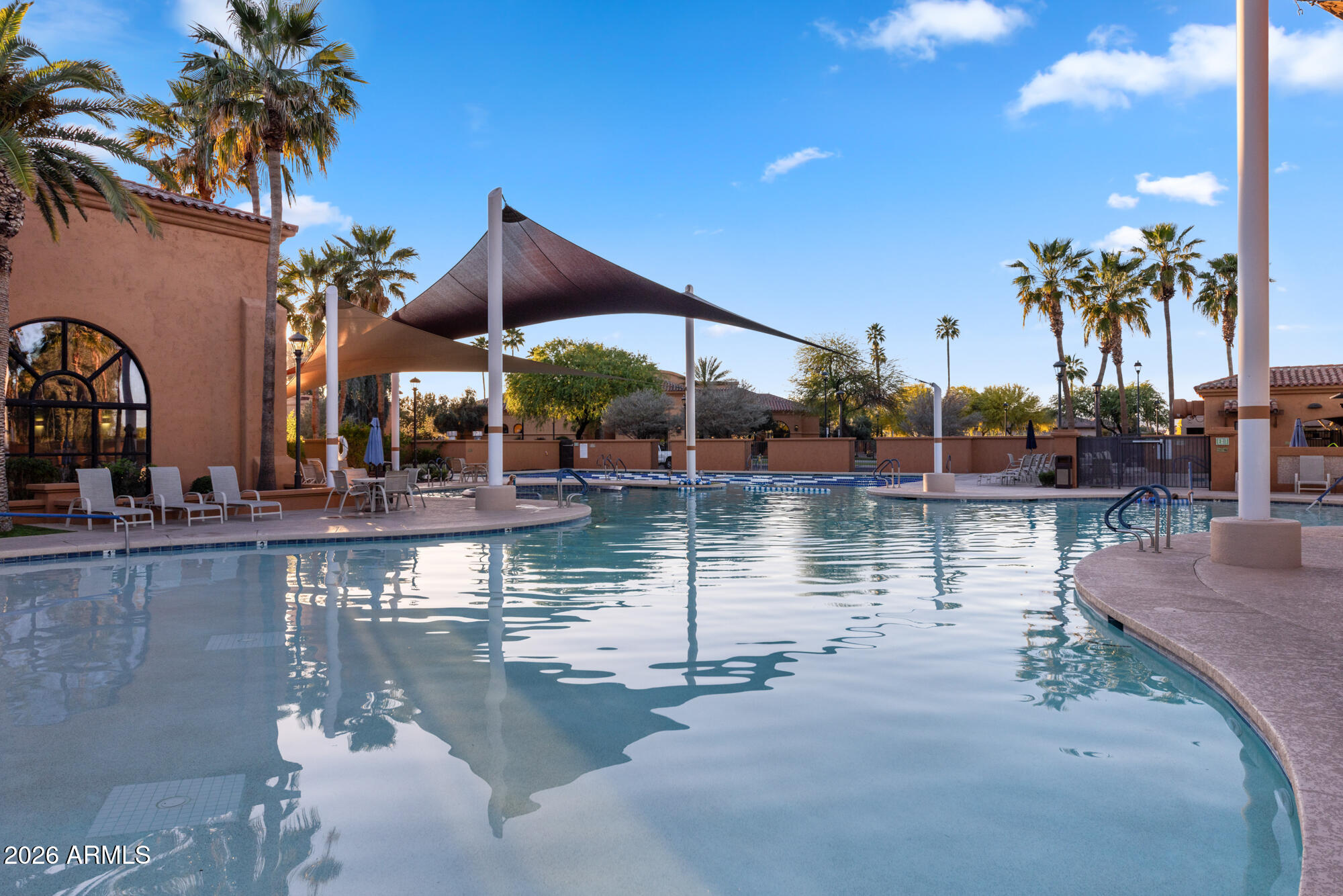 16705 Virginia Avenue Goodyear, AZ 85395 - Photo 55 of 56 a lake view with palm trees