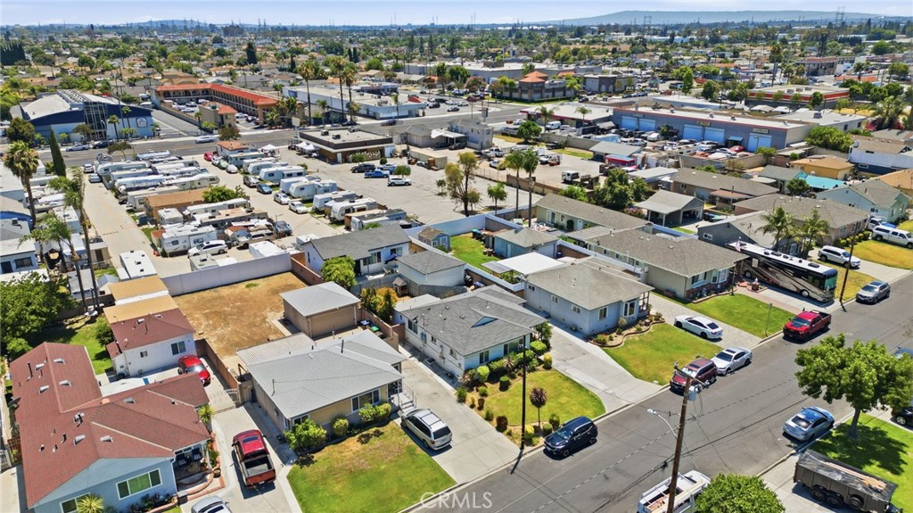 9138 Rendalia Street Bellflower, CA 90706 - Photo 11 of 11 Subject property is in center with tree in front