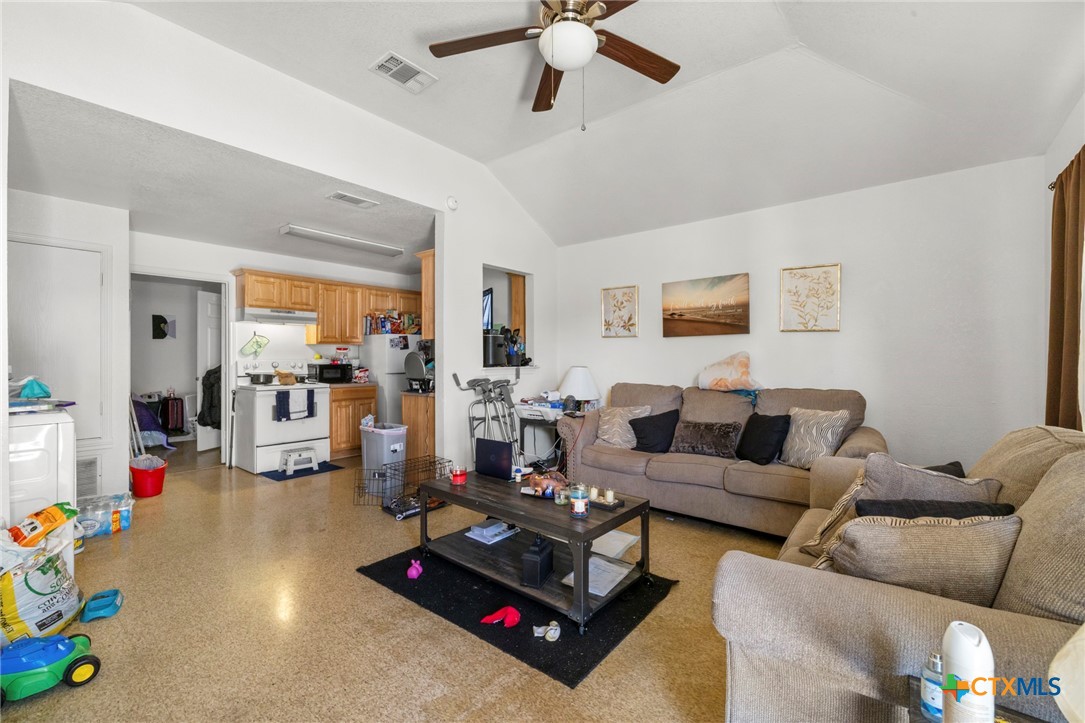 120 South 23rd Street Temple, TX 76504 - Photo 4 of 12 a living room with furniture and a flat screen tv