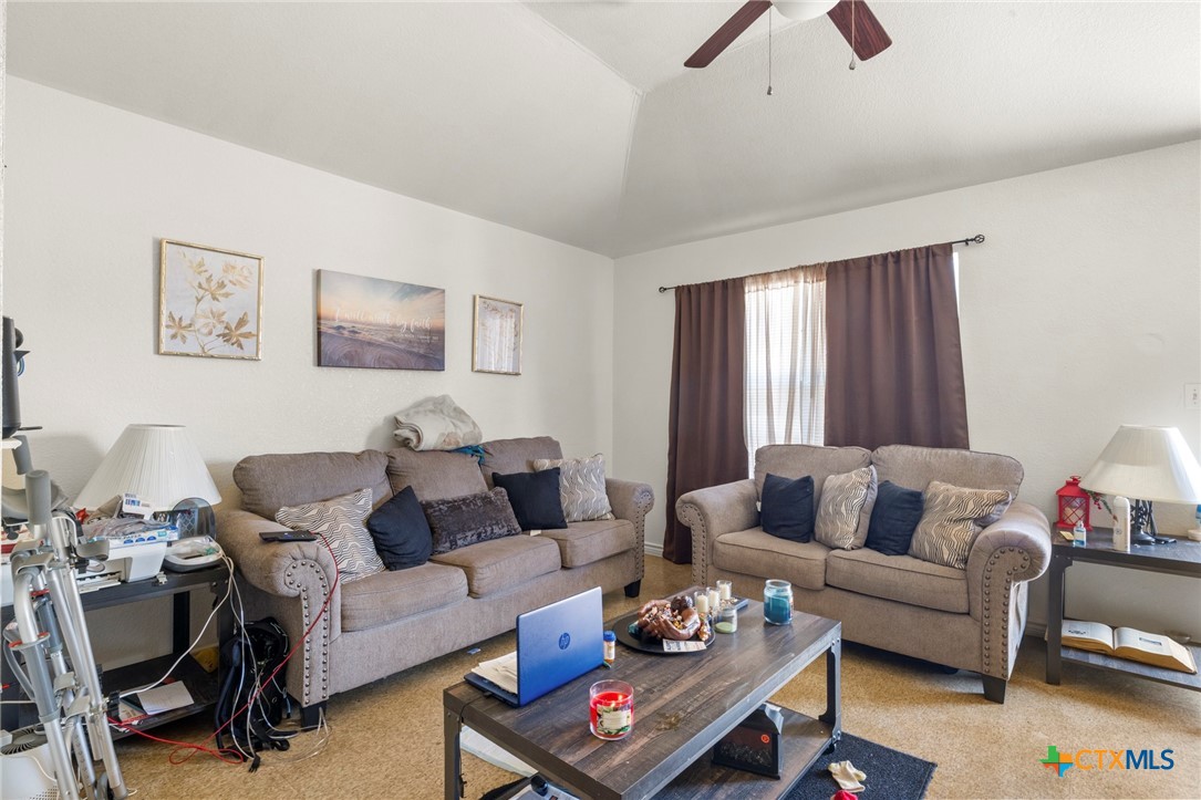 120 South 23rd Street Temple, TX 76504 - Photo 5 of 12 a living room with furniture and a couch