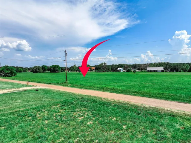 a view of a golf course with a swimming pool