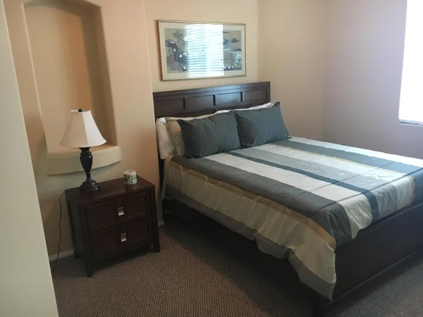 a bathroom with a bathtub and a sink