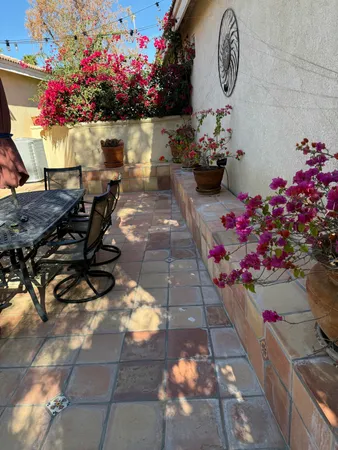 a view of a pathway with a yard