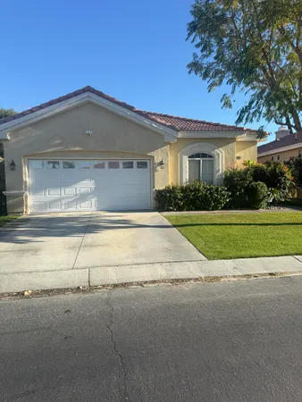 a view of backyard of a house