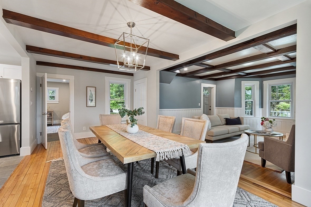 136 Groton Road North Chelmsford, MA 01863 - Photo 15 of 41 a view of a dining room with furniture window and wooden floor