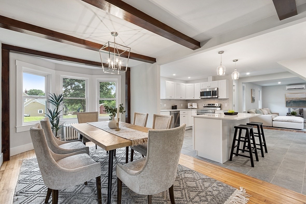 136 Groton Road North Chelmsford, MA 01863 - Photo 16 of 41 a view of a dining room with furniture