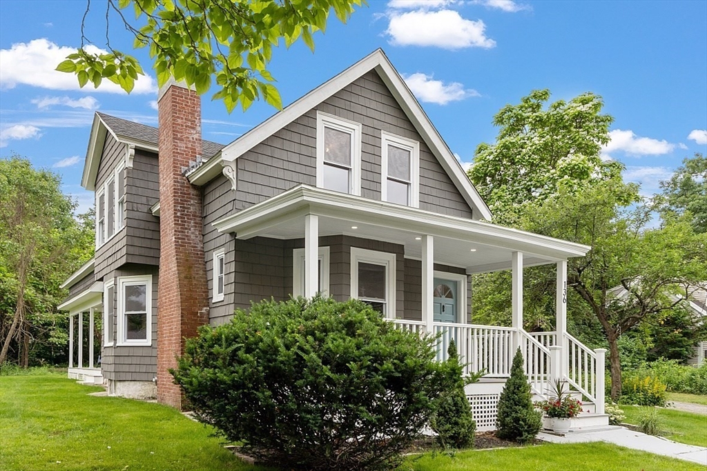 136 Groton Road North Chelmsford, MA 01863 - Photo 2 of 41 a front view of a house with a yard