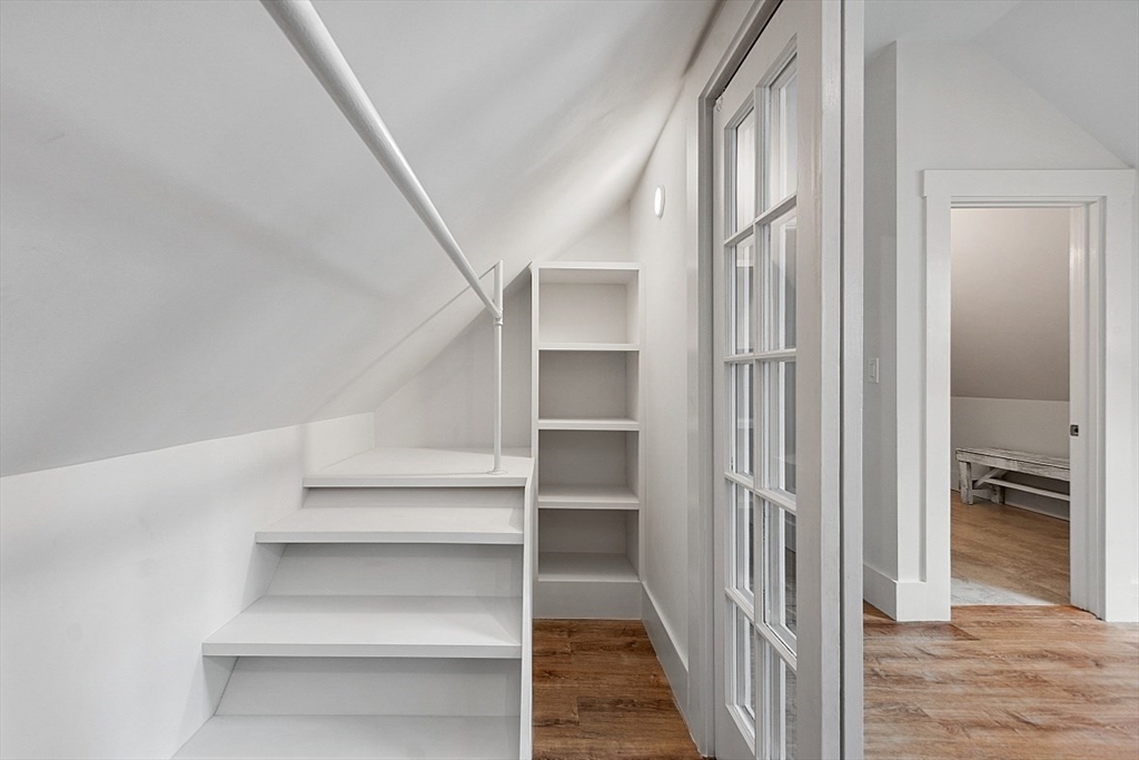 136 Groton Road North Chelmsford, MA 01863 - Photo 27 of 41 a view of a hallway with wooden floor and entryway