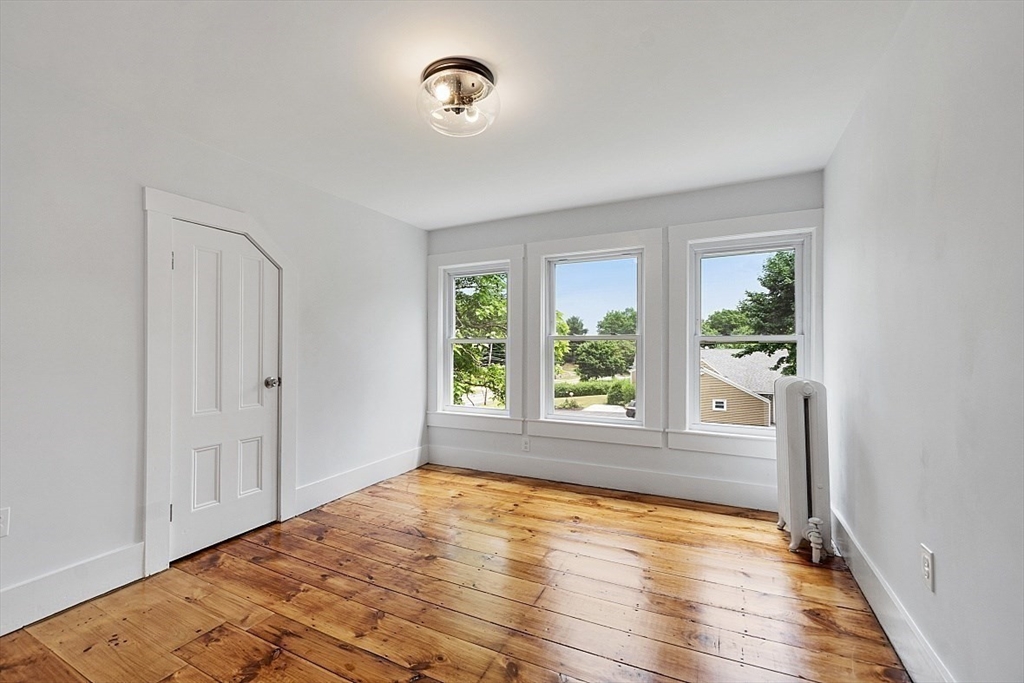 136 Groton Road North Chelmsford, MA 01863 - Photo 32 of 41 a view of an empty room with a window